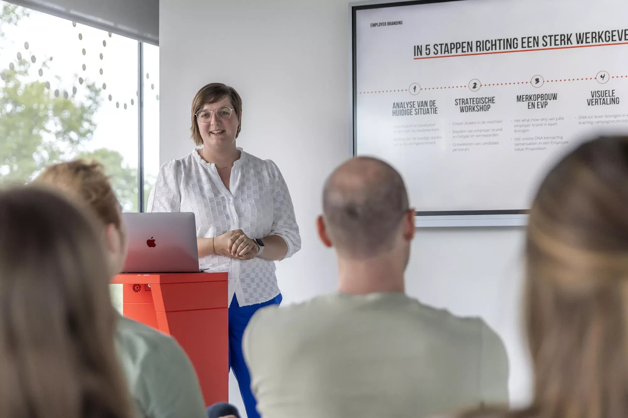 Foto van Febe Vanhauwaert over employer branding tijdens KIXX Academy